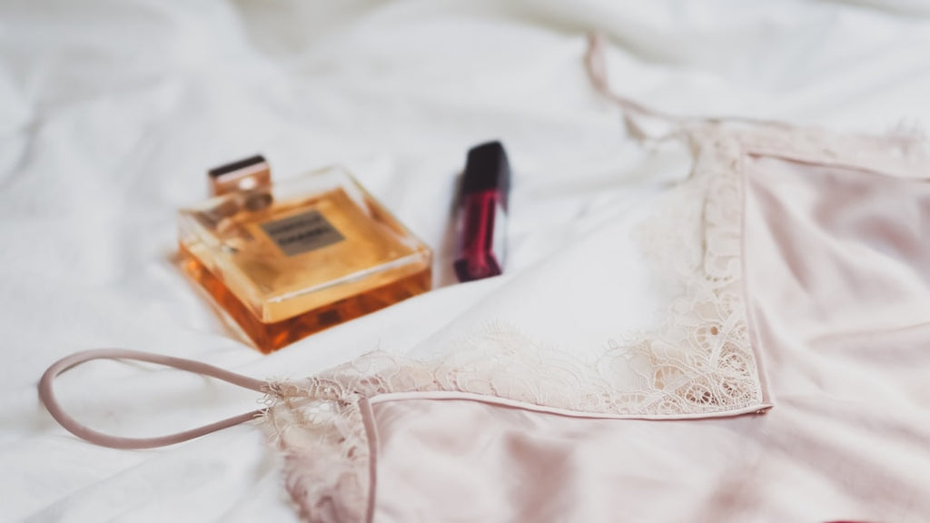 how to wash luxury lingerie - white and brown cigarette pack on white textile